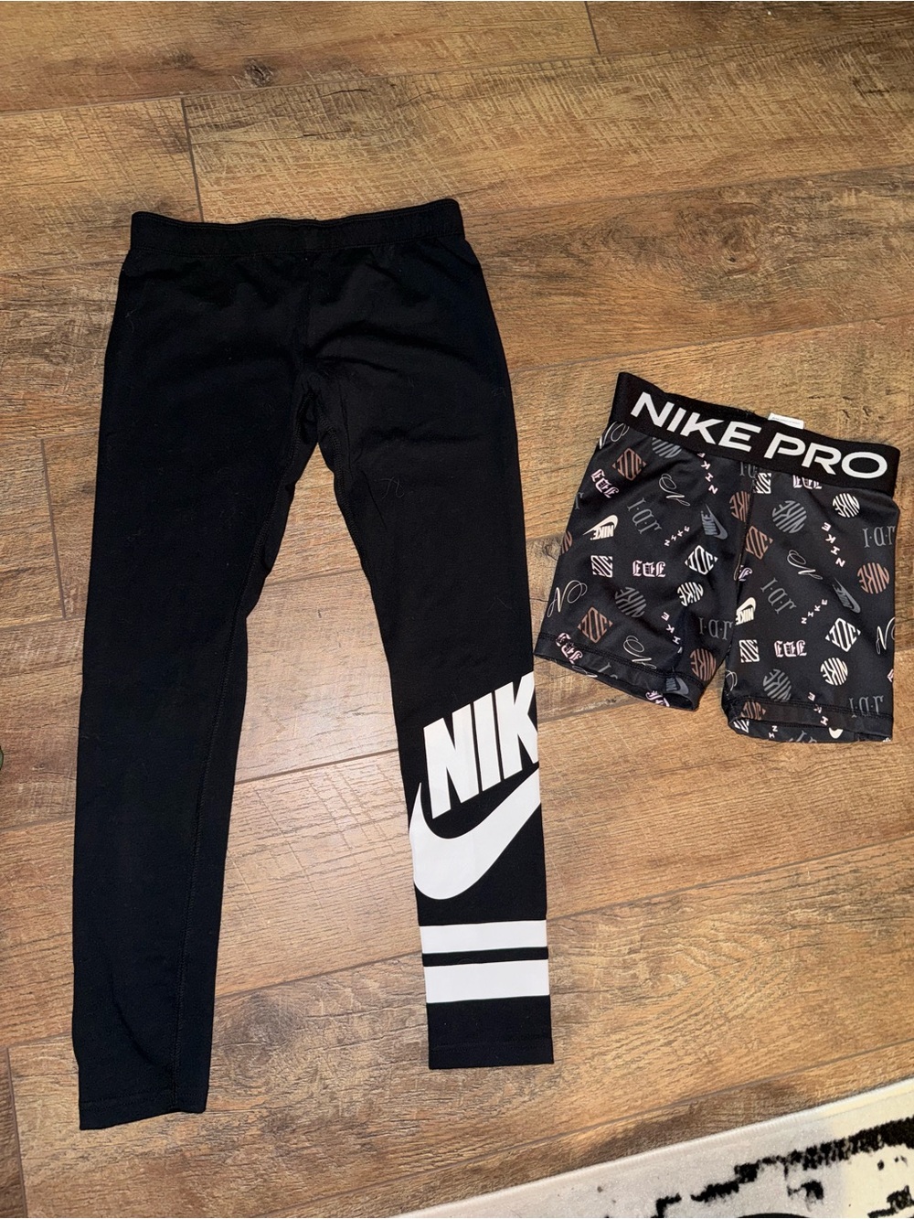 Nike Black Kids Leggings with White Logo and Stripes